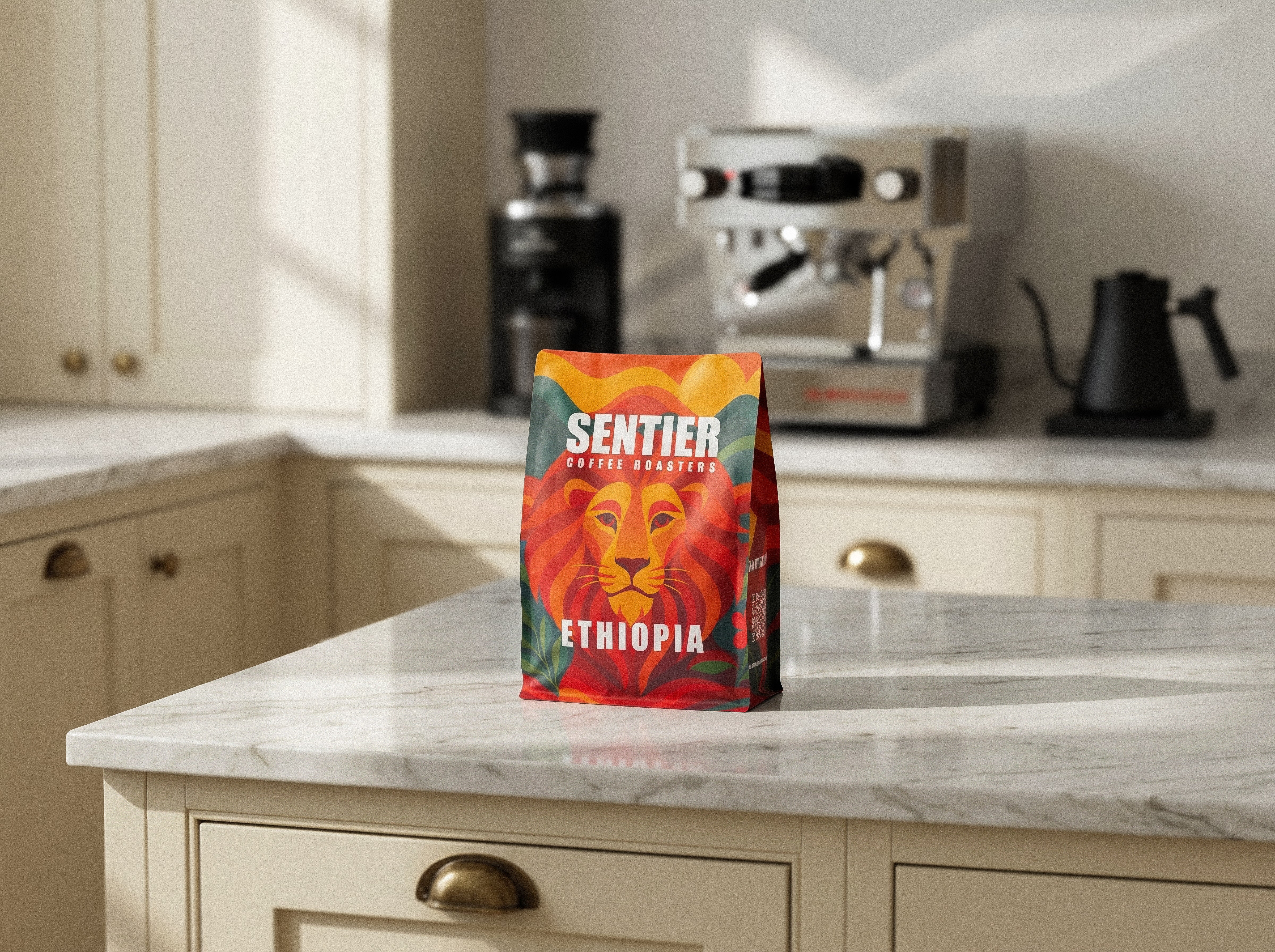 Bag of Sentier Coffee Ethiopia on a kitchen counter with coffee-making equipment in the background